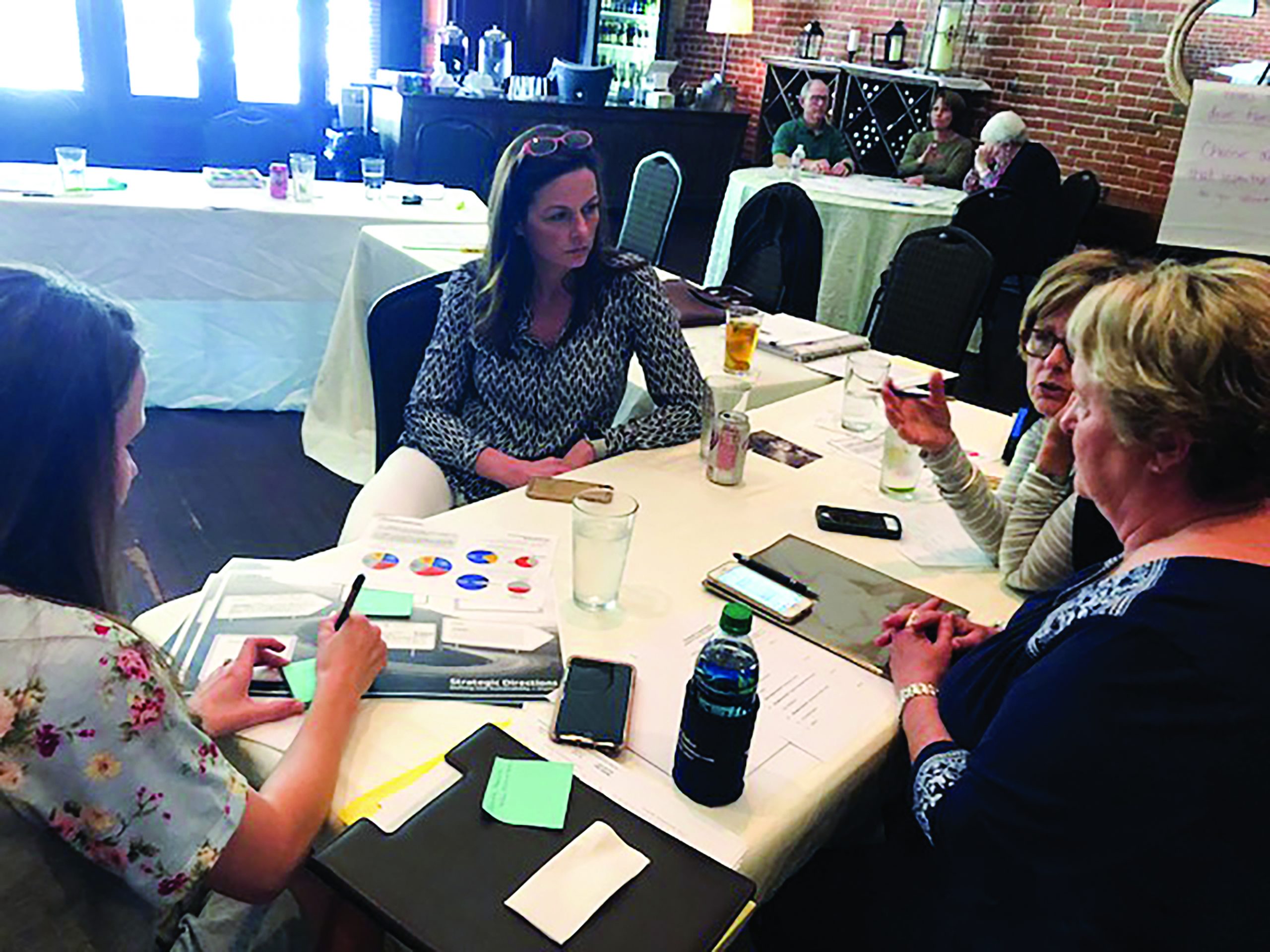 group of women meeting around a table